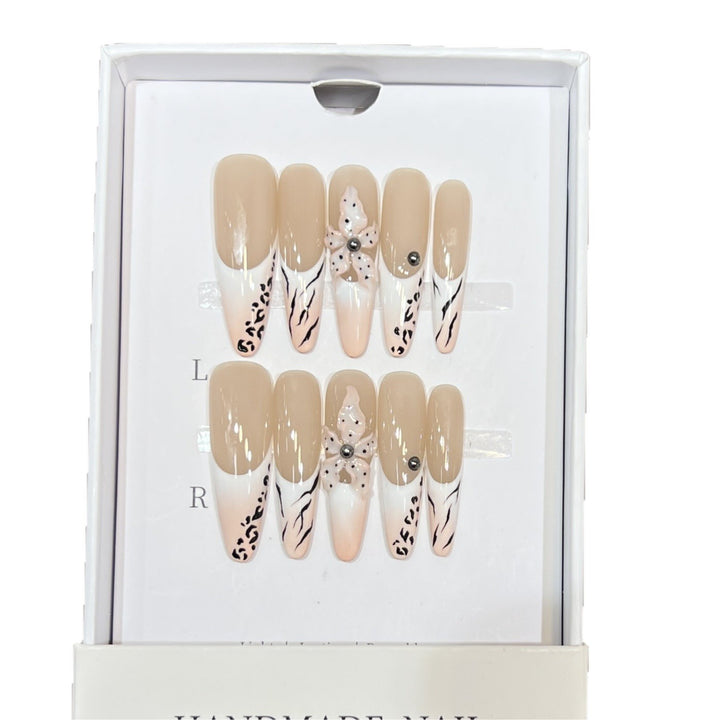 Artistic Stiletto Nail Art Set with Elegant Decorative Elements Bowlift