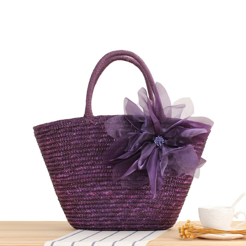 Elegant straw bag with floral accents Bowlift