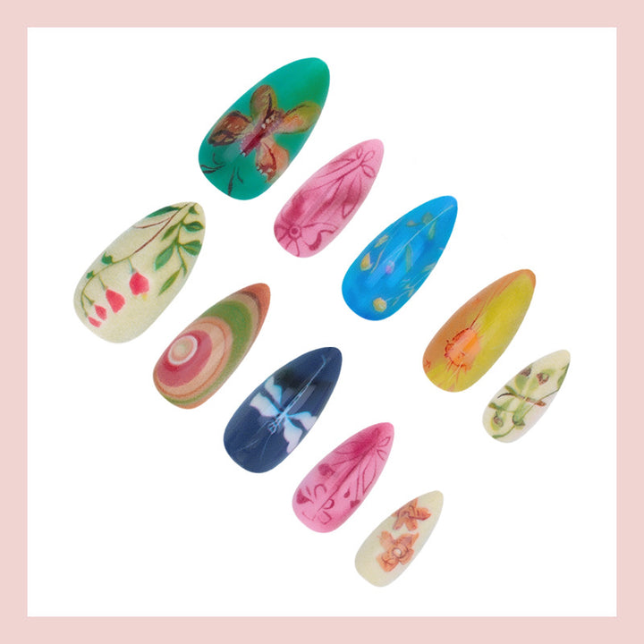 Nail art set with creative hand-painted designs and elegant details Bowlift