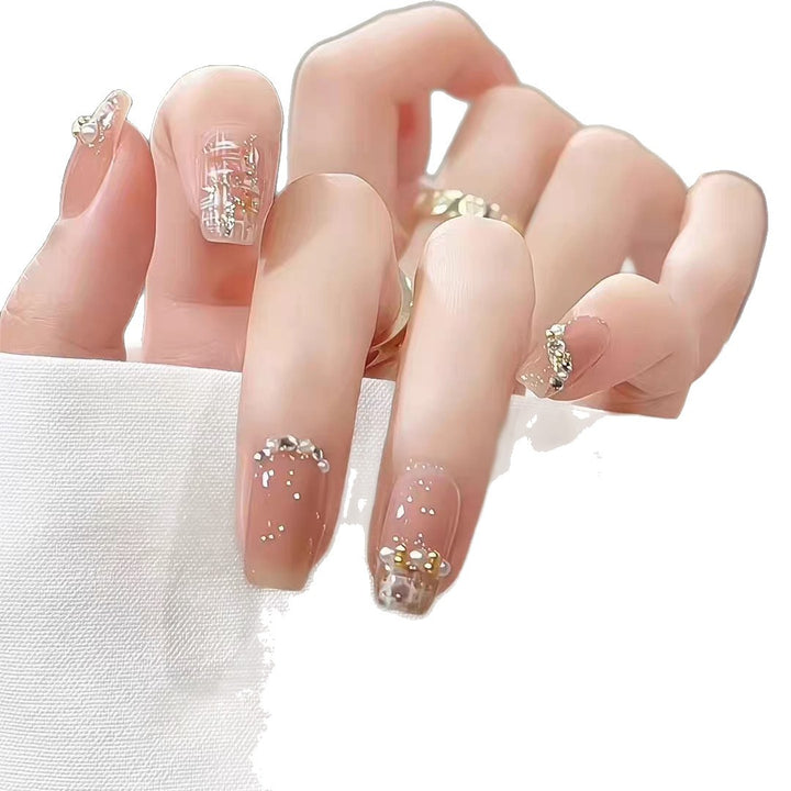 Artistic Press-On Nail Set with Elegant Floral and Decorative Accents Bowlift