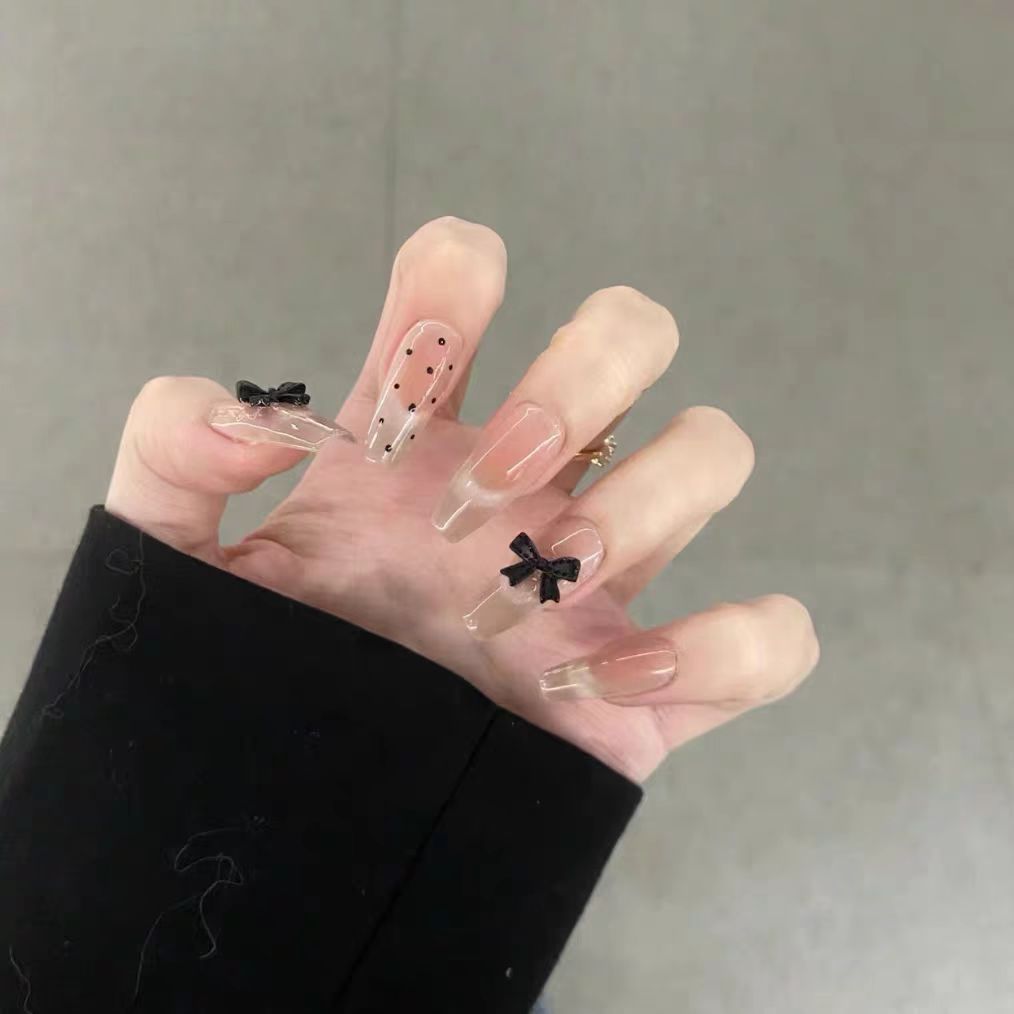 Artistic artificial nails with elegant bow motifs Bowlift