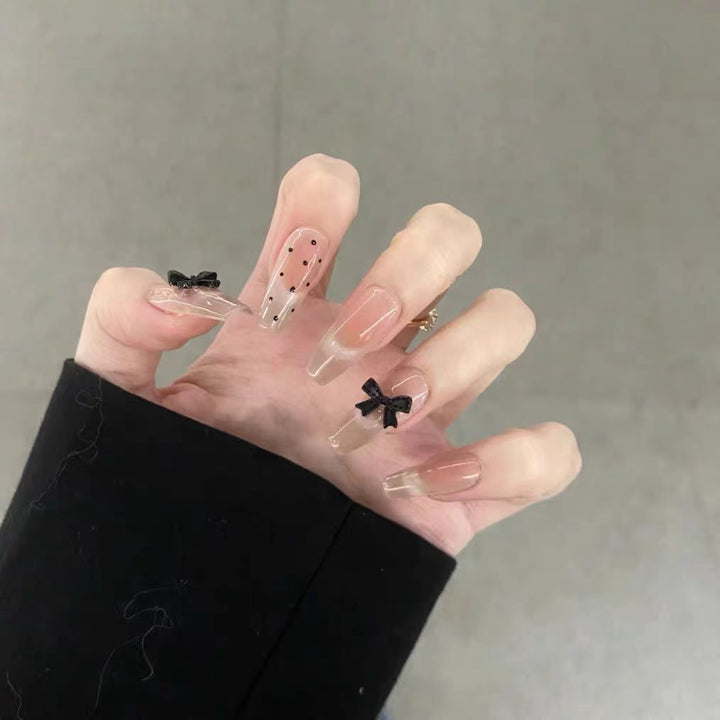 Artistic artificial nails with elegant bow motifs Bowlift