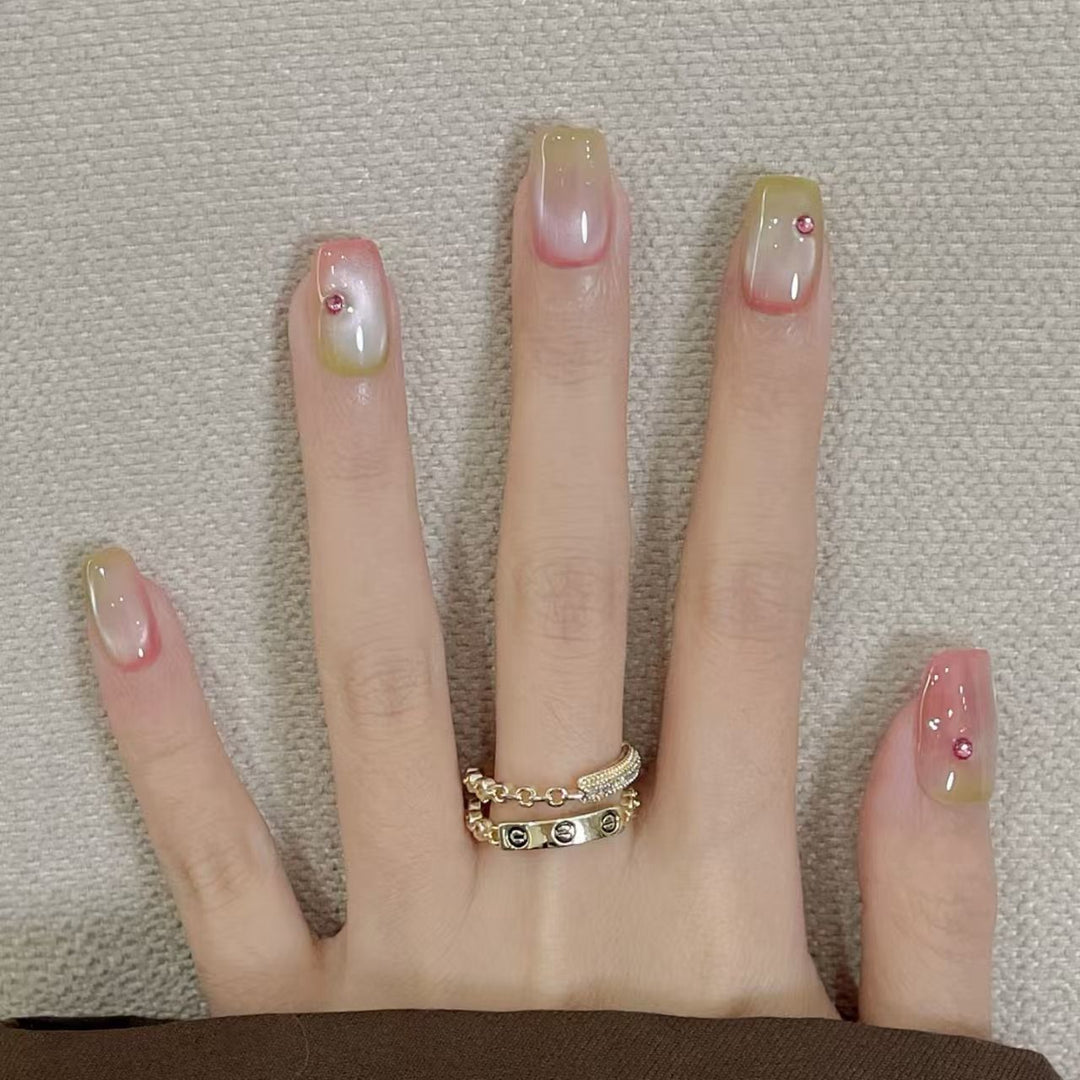 Artificial artificial nails with elegant ombre effects and glitter accents Bowlift