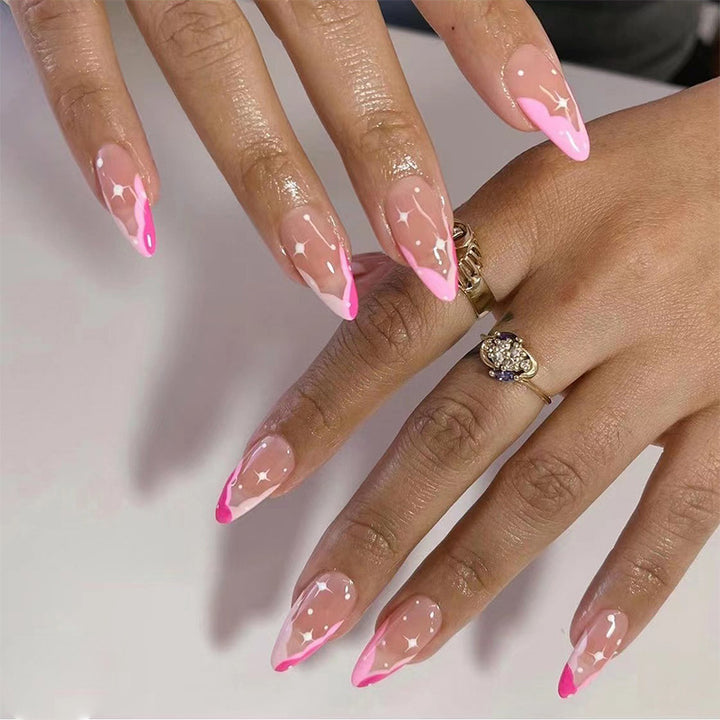 Artificial nail extensions with elegant glitter accent Bowlift
