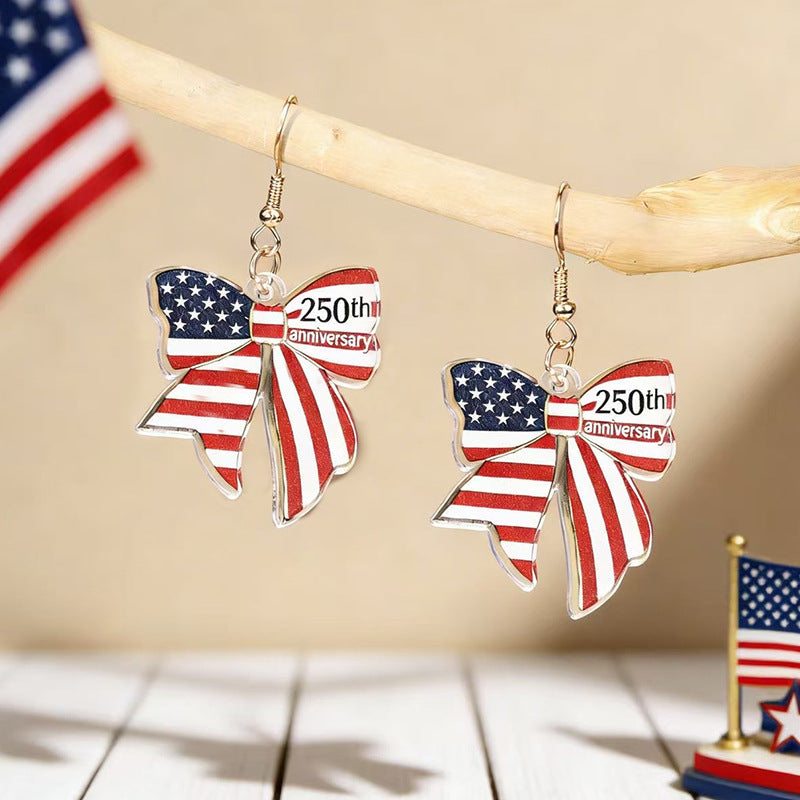 Women's eye-catching statement earrings made of acrylic with patriotic bow pendant Bowlift