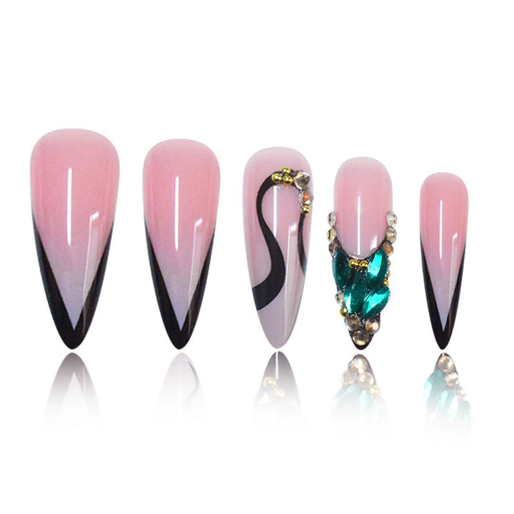 Elegant Stiletto Nail Enhancements with Gem Accents Bowlift