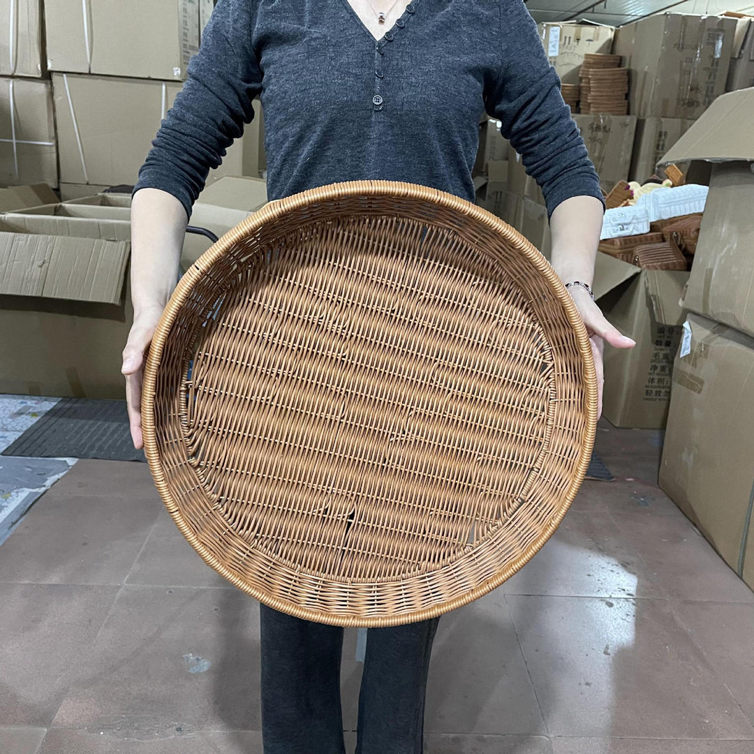Women’s round serving basket made of woven rattan Bowlift