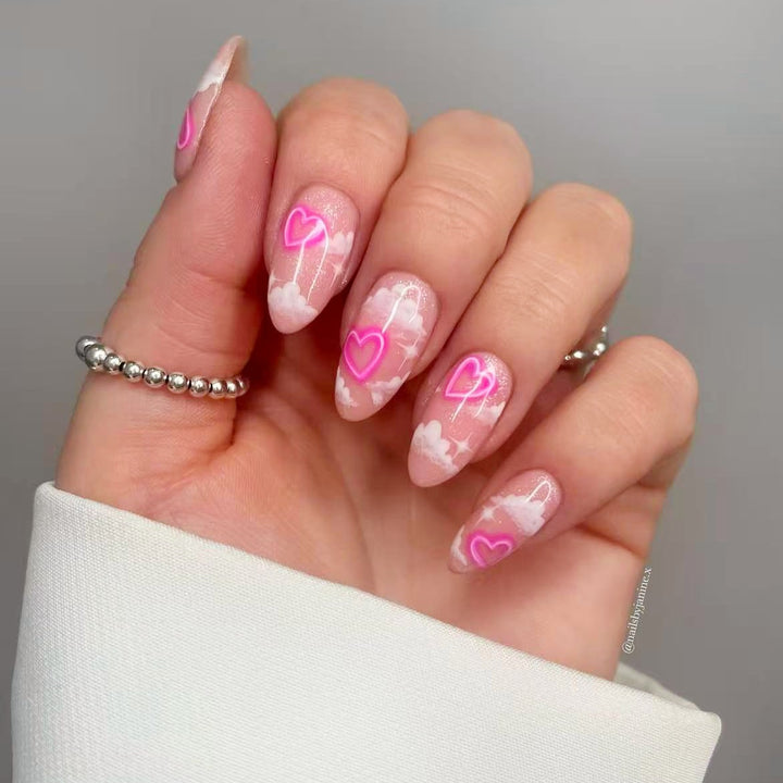 Artificial nail set with romantic heart accents and sparkling finish Bowlift