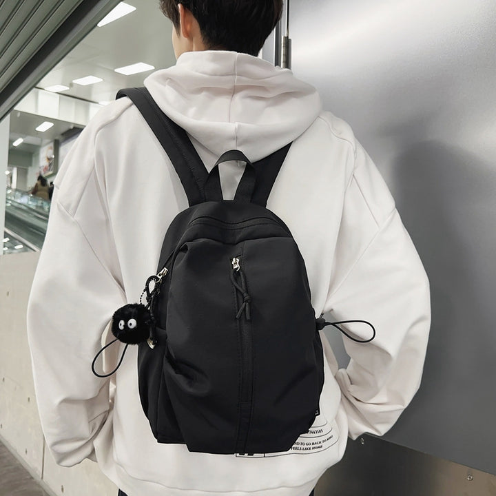 Backpack with Charming Animal Pendant and Innovative Storage Bowlift