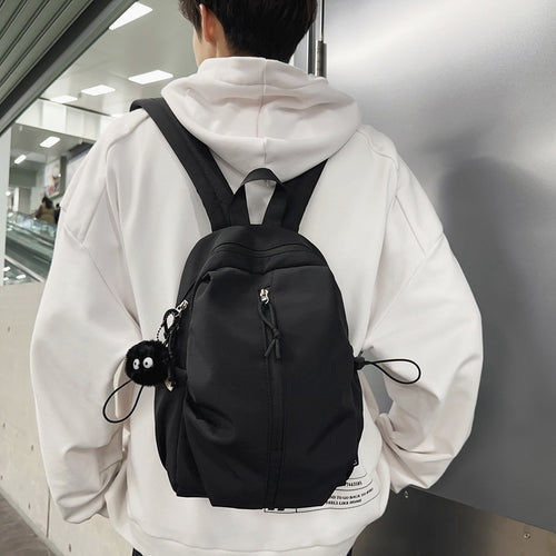 Backpack with Charming Animal Pendant and Innovative Storage Bowlift