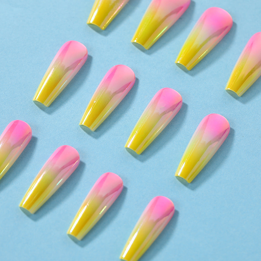 Artificial nail tips in modern ombre design Bowlift