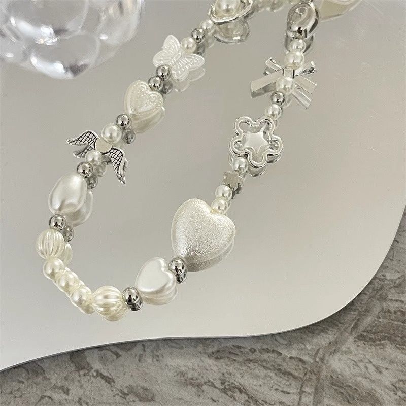 Heart and Butterfly Charm Beaded Bracelet Bowlift