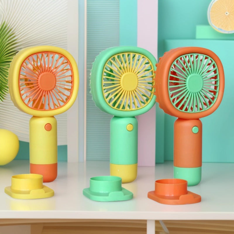 Unisex Handheld Fan with ergonomic design and practical stand function Bowlift