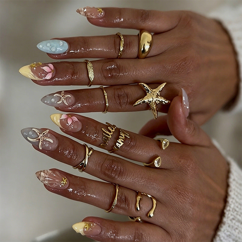 Artificial nails with floral motifs and glitter details Bowlift