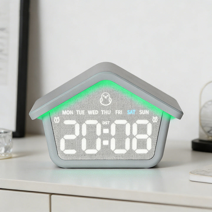 Digital alarm clock in creative house design Bowlift