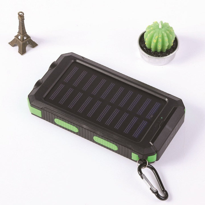 Solar charger with integrated compass and LED flashlight Bowlift