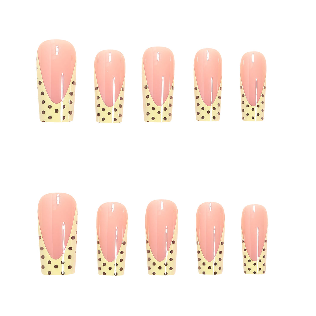 Artistic Long Nail Extensions with Polka Dot Design Bowlift