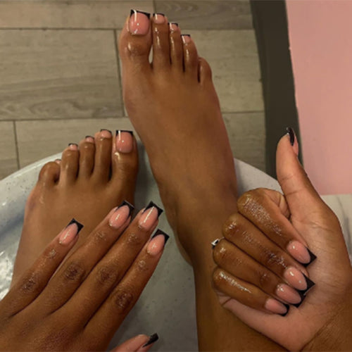 Artificial nail set with elegant French tip design and modern accents Bowlift
