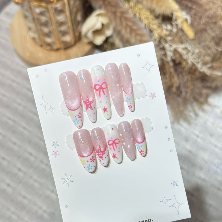 Artistic Press-On Nail Art Set with Charming Star and Bow Designs Bowlift