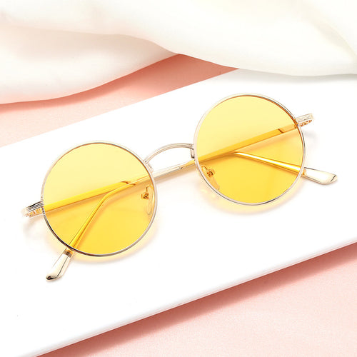 Ladies fashionable glasses with round lenses and fine metal frame Bowlift