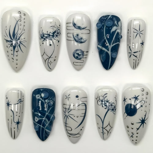 Artistic Long Stiletto Press-On Nails with Decorative Accents Bowlift