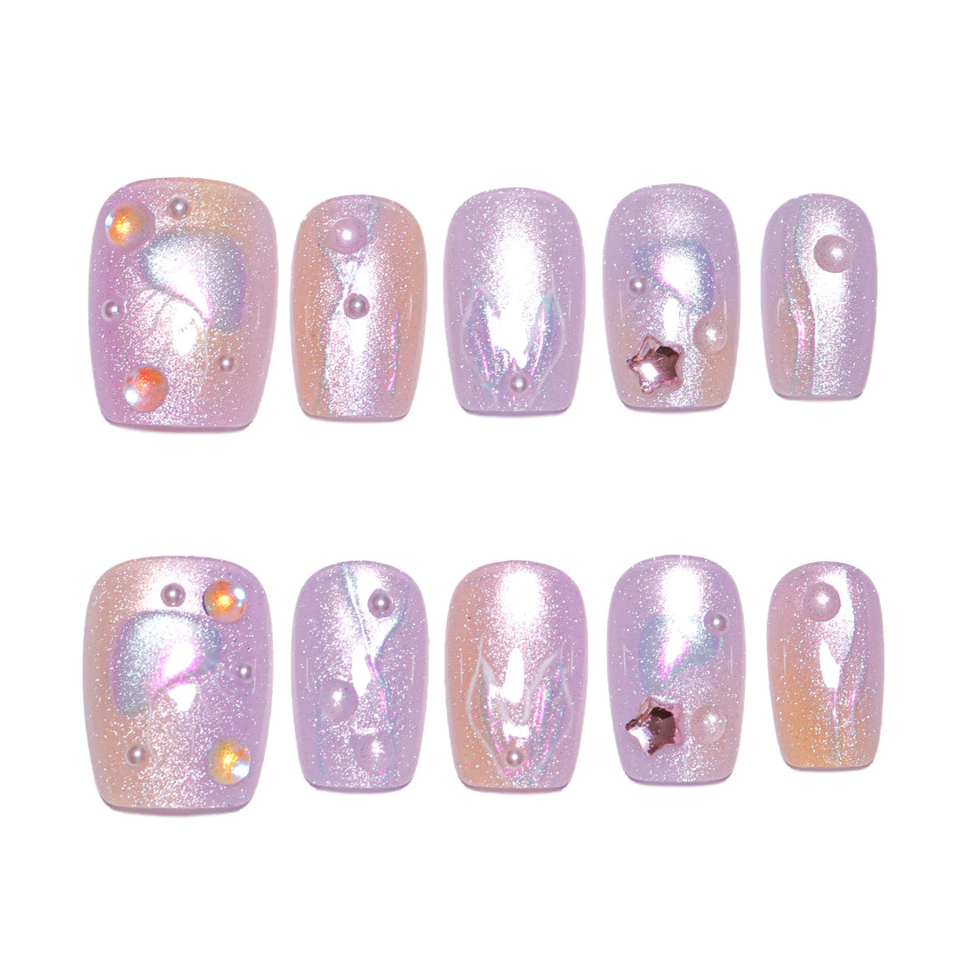Artificial nail art with sparkling accents and transparent color gradient Bowlift