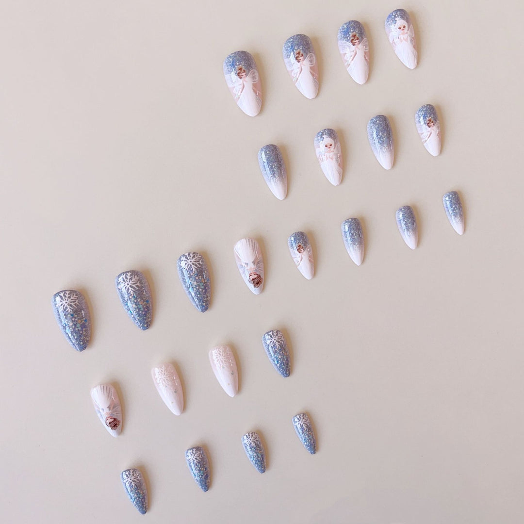 Nail art set with enchanting fairy motifs and glitter accents Bowlift