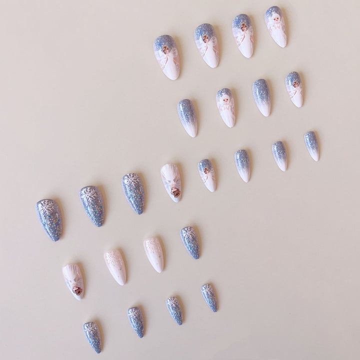 Nail art set with enchanting fairy motifs and glitter accents Bowlift