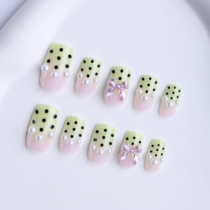 Artificial nails with playful dots and 3D elements Bowlift