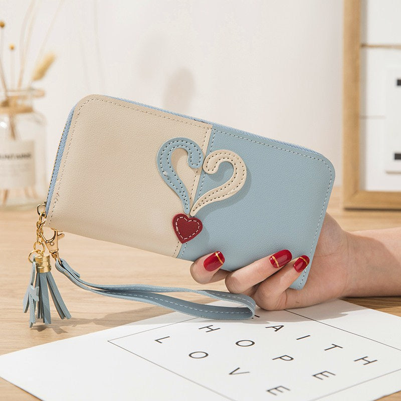 Stylish wallet with heart appliqués Bowlift