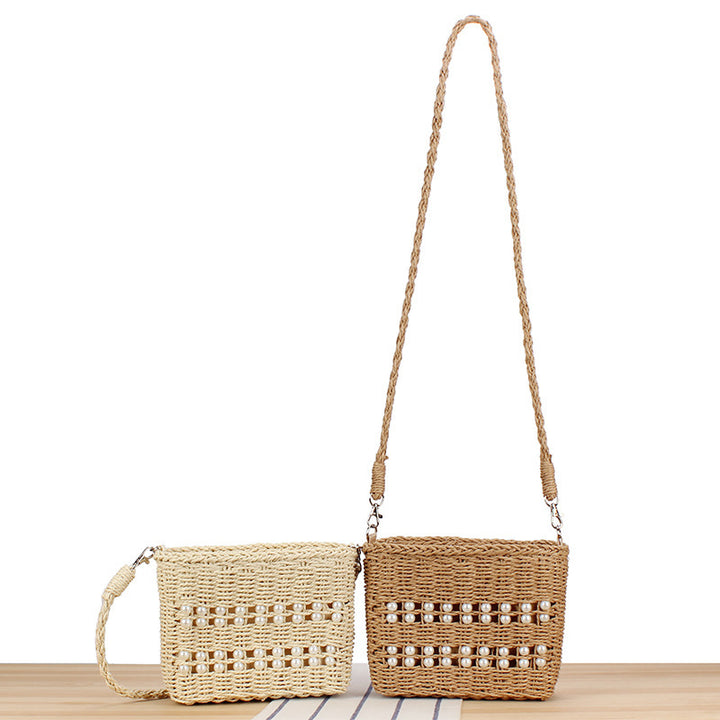 Handbag made of hand-woven natural material with pearl decoration Bowlift