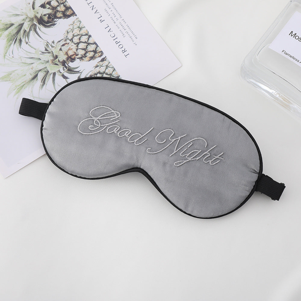 Unisex embroidered contoured sleep mask with decorative text embroidery and adjustable elastic band Bowlift