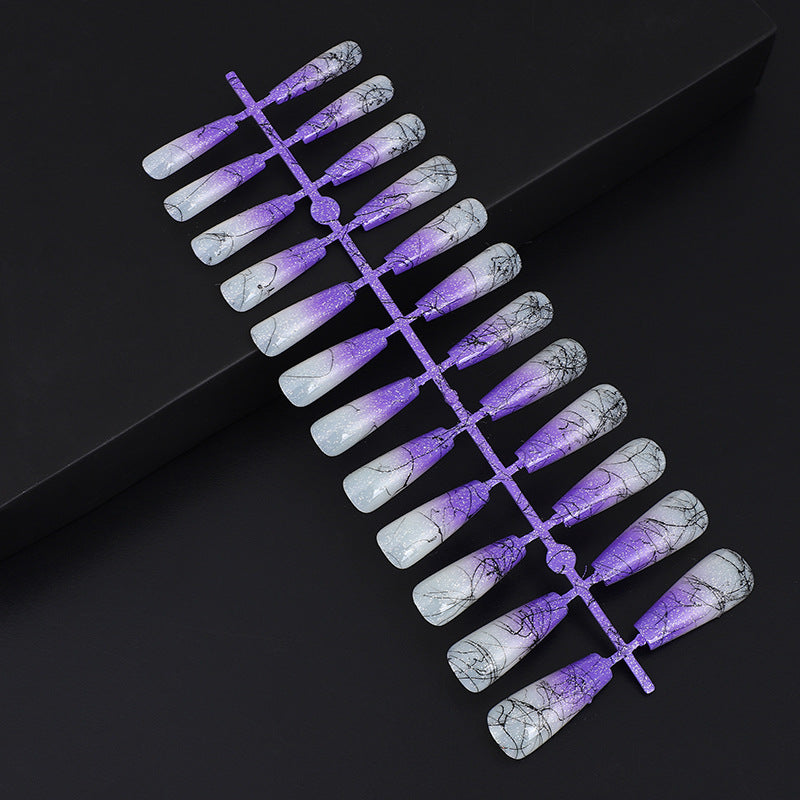 Artificial nails in modern ombre design with marbled accents Bowlift