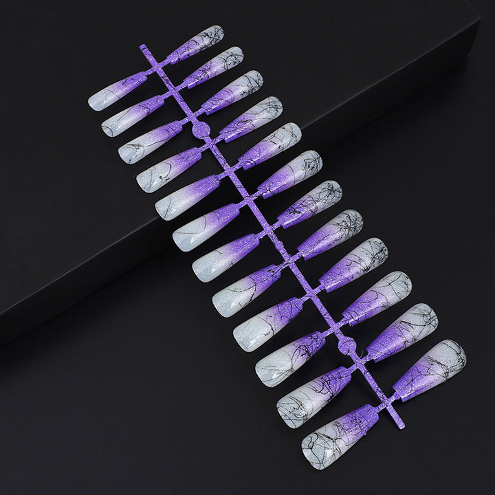 Artificial nails in modern ombre design with marbled accents Bowlift