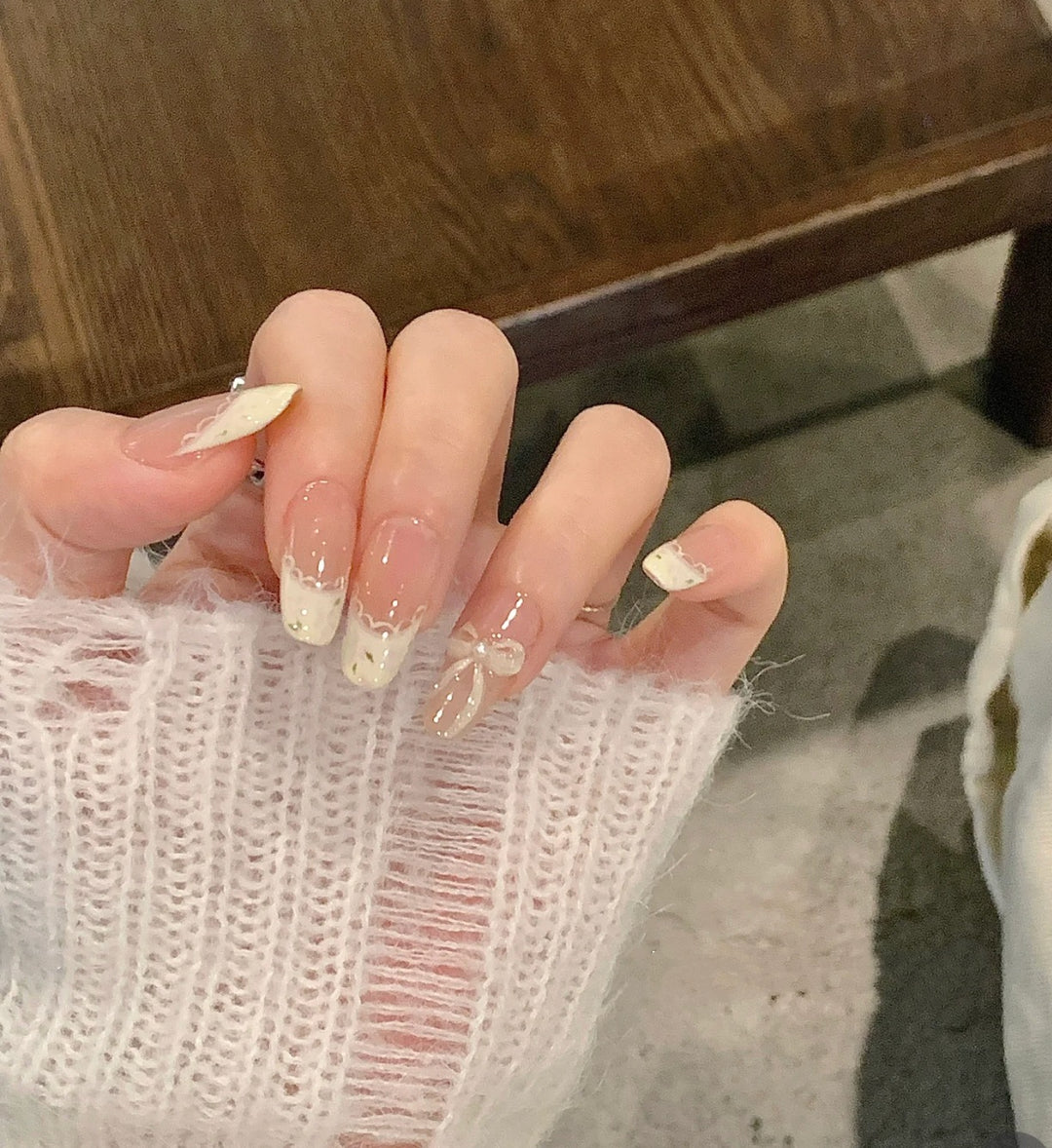 Artistic Stiletto Press-On Nails with Silver Accents Bowlift