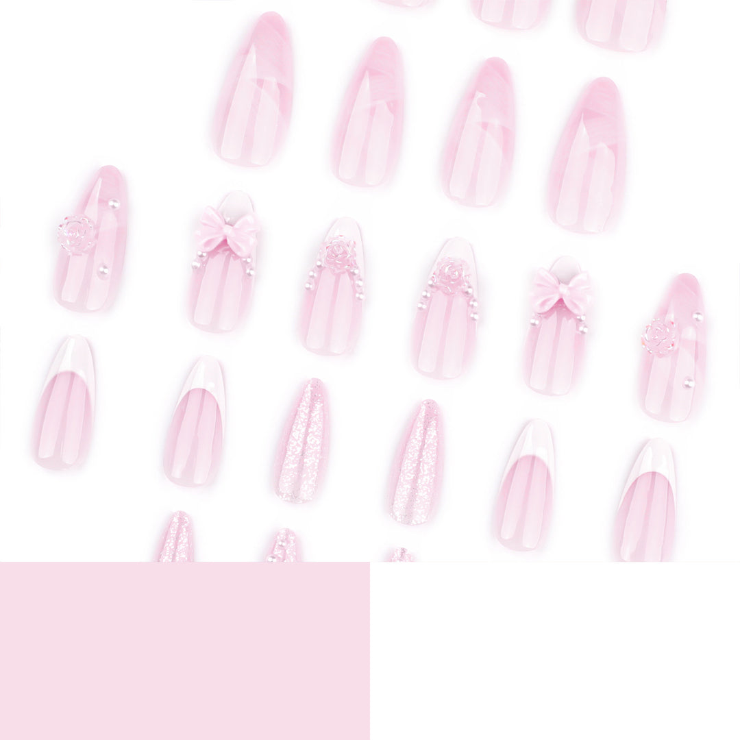 Artistic nail extensions with floral decorations and glitter accents Bowlift
