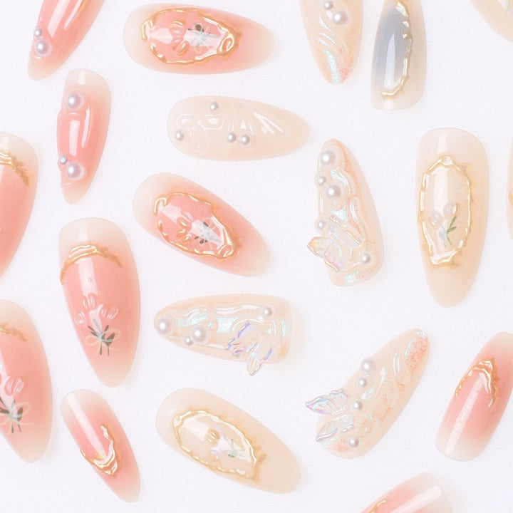 Elegant Stiletto Nail Art Extensions with Floral Embellishments Bowlift