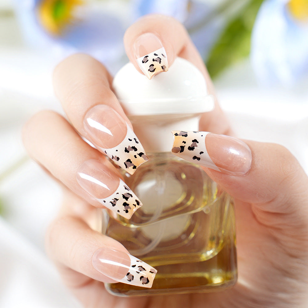 Stylish French Tip Press-On Nails with Animal Print Bowlift