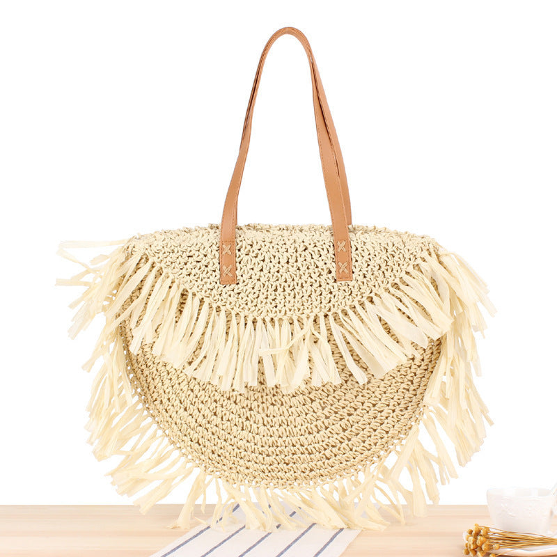 Bast crossbody bag with fringed design Bowlift