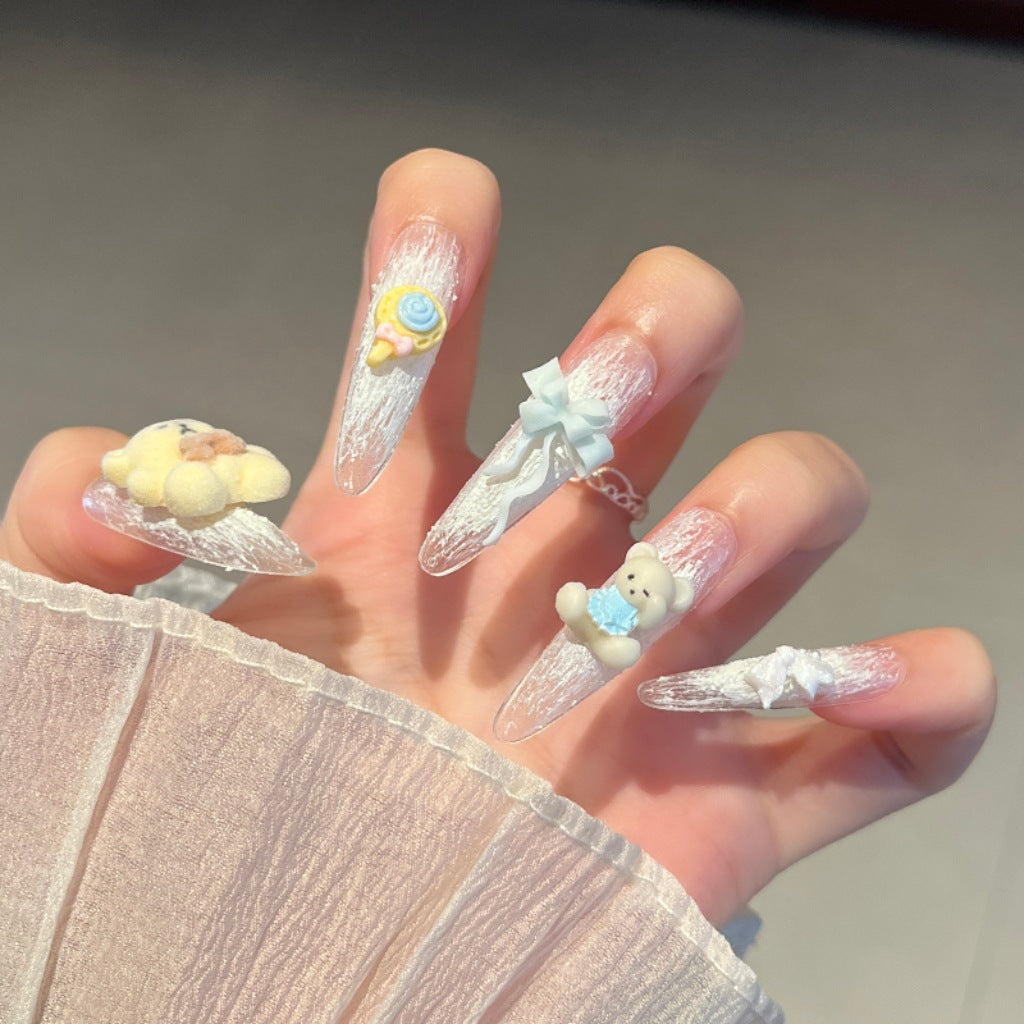 Artistic Stiletto Press-On Nail Art with Glimmering Accents Bowlift