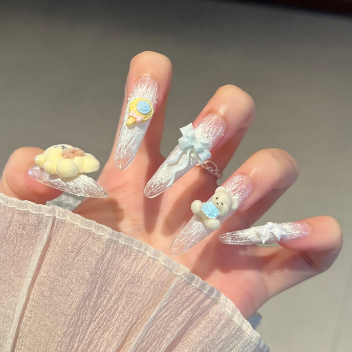 Artistic Stiletto Press-On Nail Art with Glimmering Accents Bowlift