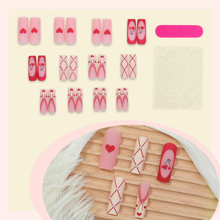 Art nail set with romantic heart and cherry motifs Bowlift