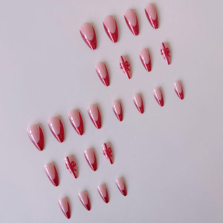 Nail set with glamorous glitter accents and bow design Bowlift