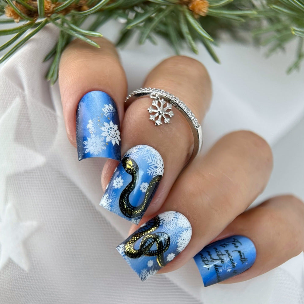 Creative art nails with snowflake and snake motif Bowlift