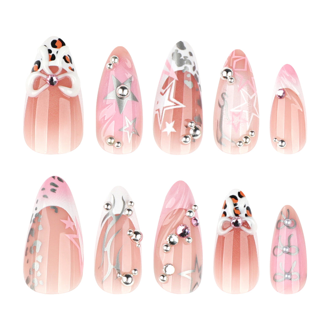 Artful stiletto nails with glitter and bow decorations Bowlift