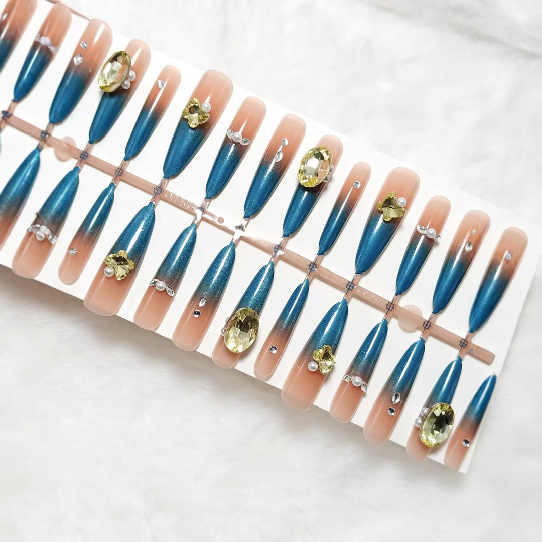 Artificial nails with glamorous stone applications Bowlift