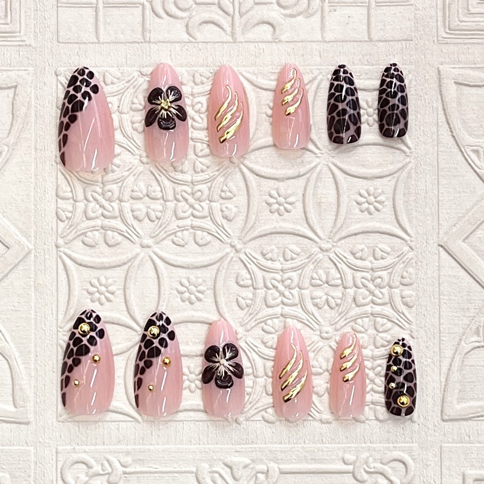 Artistic Press-On Nail Set with Floral and Leopard Accent Bowlift