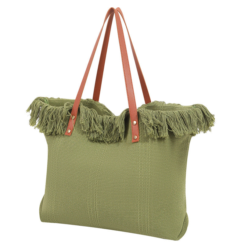 Beach bag with eye-catching fringe edge Bowlift