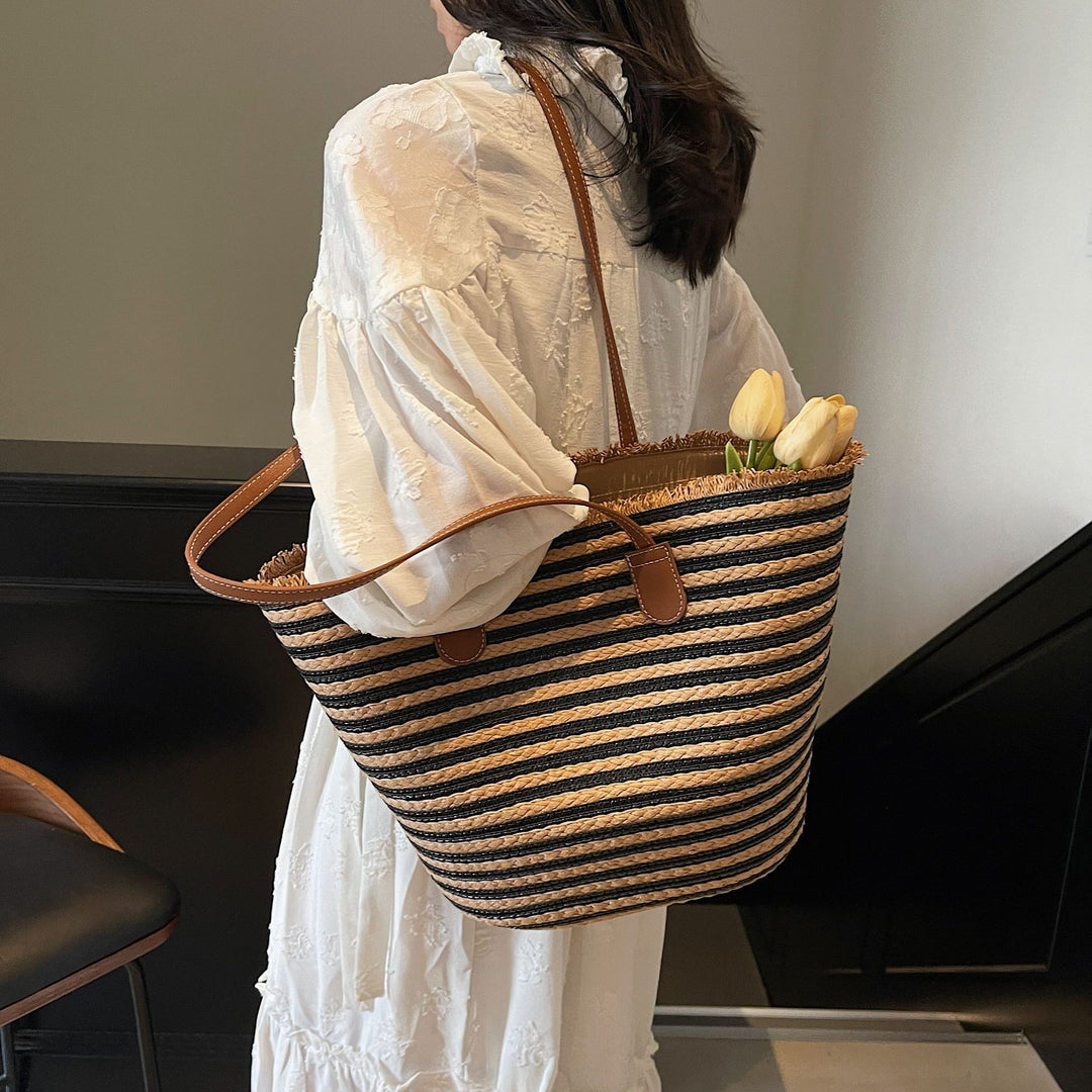 Generous beach bag with leather handles Bowlift