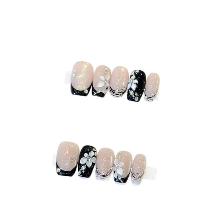Exclusive artificial nails with floral accents and glitter coating Bowlift